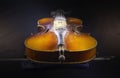 Old dusty violin with fiddlestick Royalty Free Stock Photo