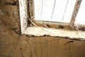 Old dusty window in the wall with cobweb