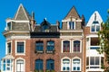 Old dutch building facade with windows. Traditional old Dutch architecture style. Royalty Free Stock Photo