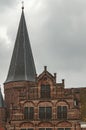 Old Dutch building with pointed tower Royalty Free Stock Photo