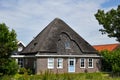 Old Dutch farmhouse with semi thatched roof Royalty Free Stock Photo