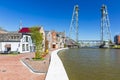 Old Dutch historic houses and vertical lift bridge crossing the river Gouwe at Boskoop, the Netherlands