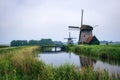 Old dutch windmill in cold morning scenery near Amsterdam Royalty Free Stock Photo