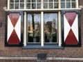 Old dutch window with shutters in laiden