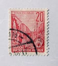 Old east german red postage stamp with a street scene commemorating a road called stalinallee Royalty Free Stock Photo