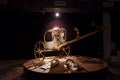 Old Egyptian golden war chariot in a museum. Interior view.