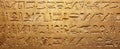 Old Egyptian hieroglyphs on an ancient background. Wide historical and culture background. Ancient Egyptian hieroglyphs as a Royalty Free Stock Photo