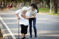 Old elderly having heartbeats fast,short of breath,symptoms of heart problems,asian senior woman with chest pain from heart attack Royalty Free Stock Photo