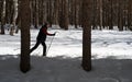 Old Elderly Man Cross Country Skiing in Winter Forest Snow Royalty Free Stock Photo