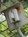 Old electric bell button on the fence Royalty Free Stock Photo