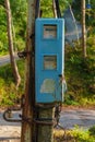 Old Electric Meter Box on Rusty Pole Royalty Free Stock Photo