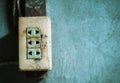 Old electric outlet on wall , safety and dangerous electric background Royalty Free Stock Photo