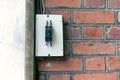 Old electric power outlet, circuit breaker on brick wall Royalty Free Stock Photo