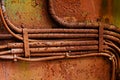 Old electrical cables on dirty rusty iron wall Royalty Free Stock Photo