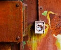 Old electrical outlet on the rusty iron wall Royalty Free Stock Photo