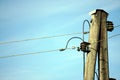 Old electricity pole exposed with sky background Royalty Free Stock Photo