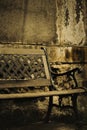 An old, elegant bench. The empty bench evokes a sense of nostalgia and harks back to a forgotten past. Memory, loss, and the