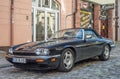 Old elegant luxury car Jaguar convertible parked