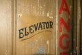 An Old Elevator Door With Old Fashioned Text That Says Elevator Royalty Free Stock Photo