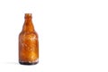An old empty bottle of beer on a white background Royalty Free Stock Photo