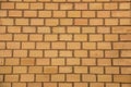 Old empty brick house factory wall with yellow bricks Royalty Free Stock Photo