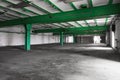 Old empty industrial warehouse interior, bright light Royalty Free Stock Photo