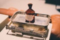 Old empty medicine bottle on scale - vintage Royalty Free Stock Photo