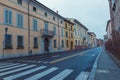 Old empty street early morning view in Ravenna, Italy