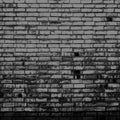 Old empty weathered dark brick wall texture Royalty Free Stock Photo