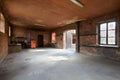 Old, empty workshop interior with brick walls Royalty Free Stock Photo