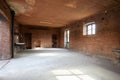 Old, empty workshop interior with red brick walls Royalty Free Stock Photo