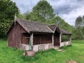 An old English cricket pavilion with roller