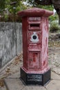 An old English post box in Sri Lanka. Royalty Free Stock Photo