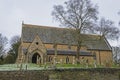 Old English rural village church with graveyard cemetary Royalty Free Stock Photo