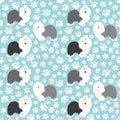 Old English Sheepdog seamless pattern background with hand drawn paws. Cute cartoon long haired dog background. Royalty Free Stock Photo