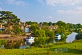 Old English village next to river Royalty Free Stock Photo