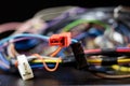 Old entangled cables, electronics and old cable connectors on a Royalty Free Stock Photo