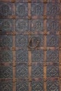 Old entrance doors of buildings with metal bars. Background for old architecture. The craftsmanship of a blacksmith Royalty Free Stock Photo