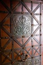 Old entrance doors of buildings with metal bars. Background for old architecture. The craftsmanship of a blacksmith Royalty Free Stock Photo