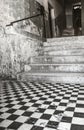 Old entrance with stairs - black white tiles Royalty Free Stock Photo