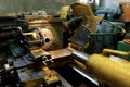 A lathe with a blank in the spindle. Old equipment at the factory from the mid-20th century. Royalty Free Stock Photo