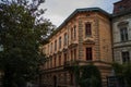 old estate exterior apartments of brick walls in city street of Eastern Europe