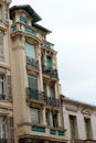 Old European architectural building corner with balconies and penthouse Royalty Free Stock Photo