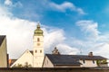 Old European church roof over cloudy sky Royalty Free Stock Photo