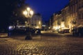 Old European city pedestrian street night city lights. O Royalty Free Stock Photo