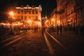 Old European city pedestrian street night city lights Royalty Free Stock Photo