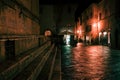 Old European narrow empty street of a medieval town at evening. Royalty Free Stock Photo