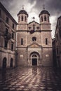 Old European St. Nicholas Orthodox Church in front of dramatic sky in old European city Kotor in Montenegro Montenegro, Kotor, T