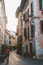 Old European street with architecture in italy in the evening on the shores of Lake Lago di garda Royalty Free Stock Photo