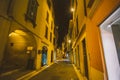 Old European street with architecture in italy in the evening on the shores of Lake Lago di garda